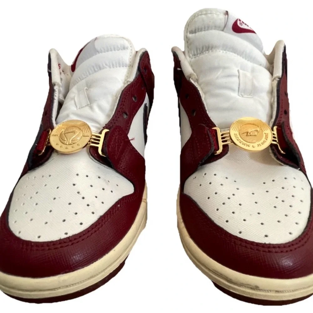 Nike Women’s White and Burgundy Sneakers with Gold Accents